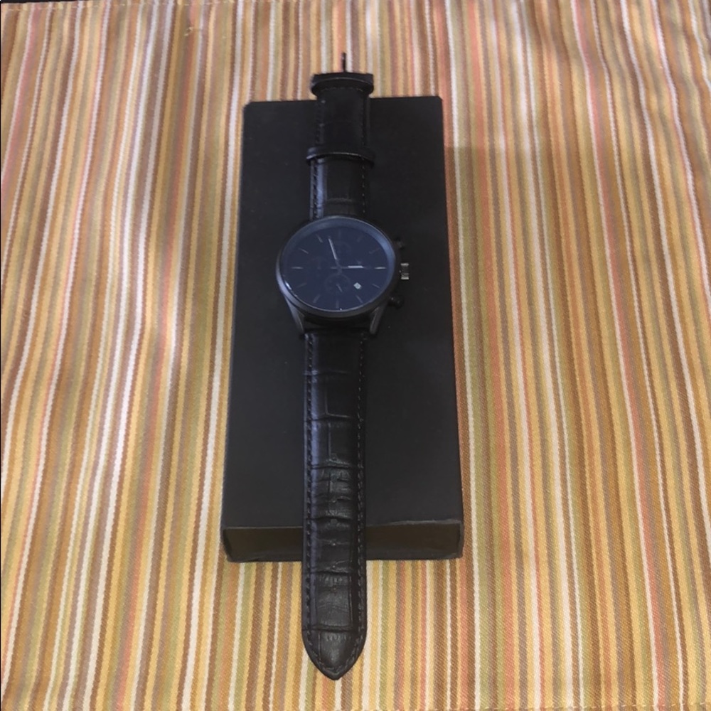Black leather strap watch
